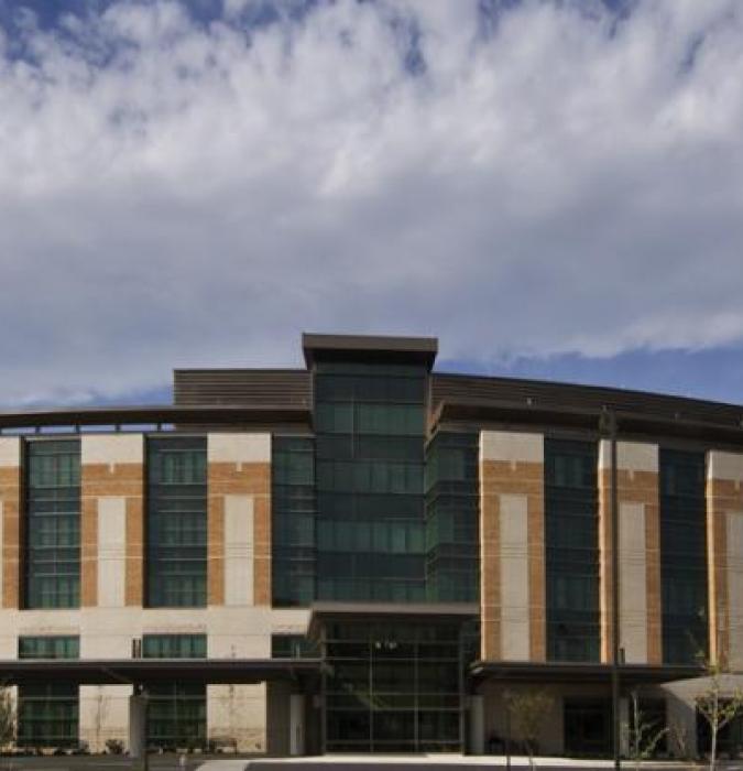 Exterior photo of Lynchburg General Hospital building, cloudy blue sky